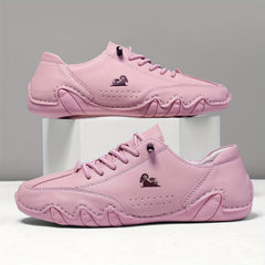 Scarpe leggere rosa con lacci, logo sul lato e suola con rilievi