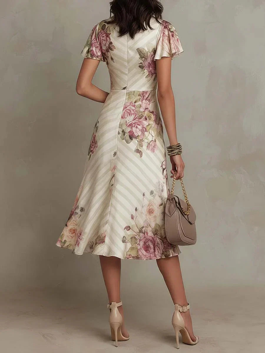Floral ruched wrap midi dress, cream base with pink rose print and short puff sleeves