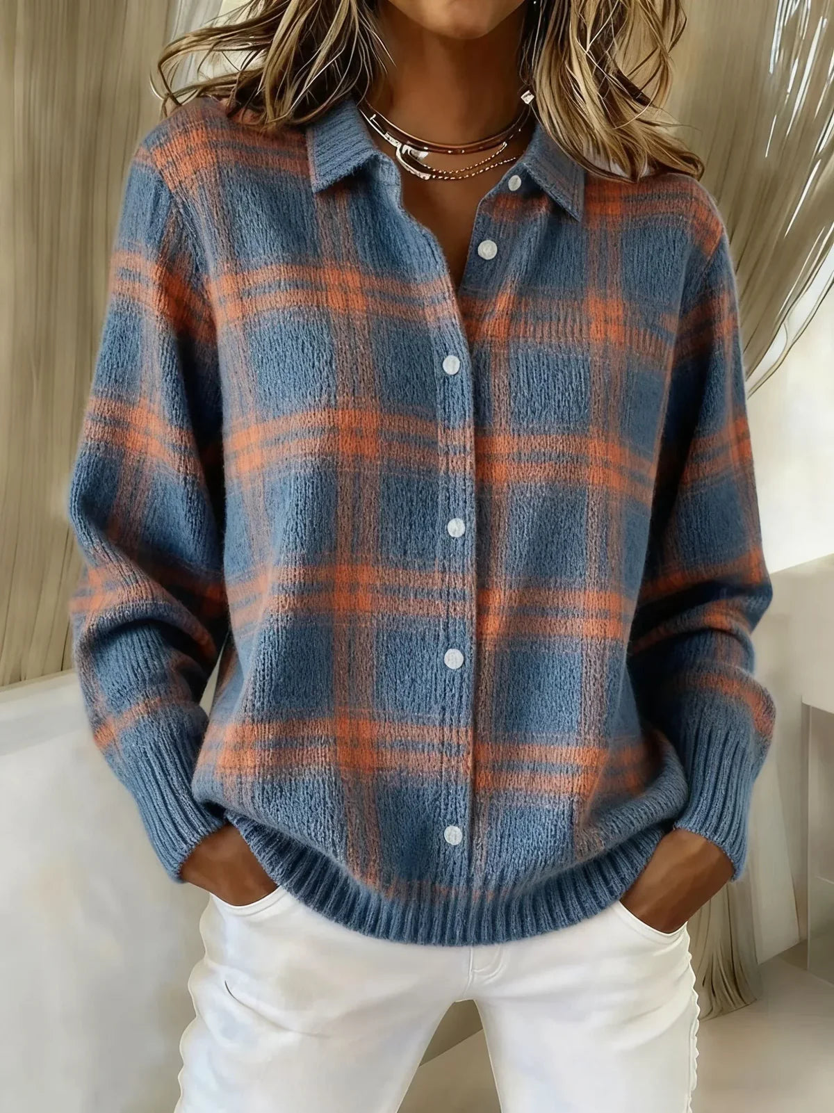 Blue and orange plaid knit cardigan with button front, collared V-neck, long sleeves