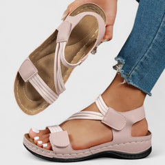 Sandali ortopedici leggeri rosa con cinturini regolabili e fascia elastica, suola sagomata