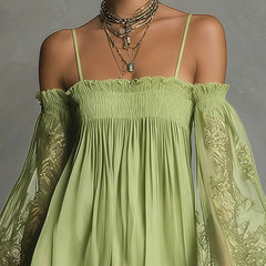 Lime green off-shoulder chiffon mini dress with smocked bodice and lace-trim sheer sleeves.