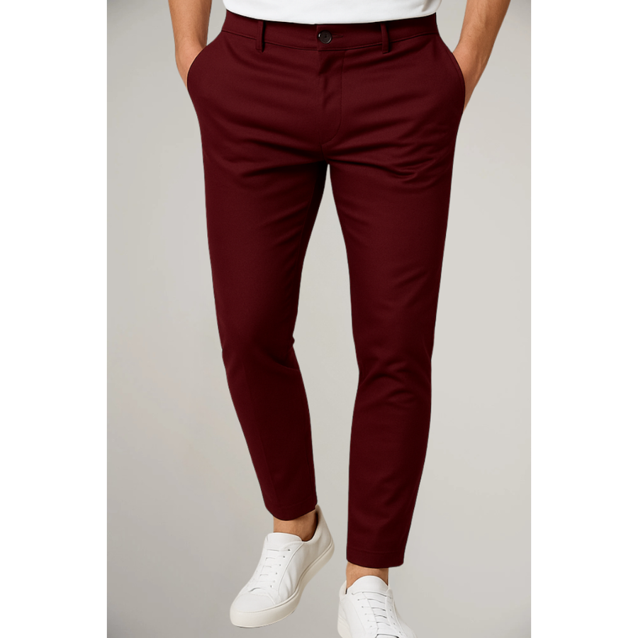 Slim-fit tailored dark red trousers with front pockets and belt loops.