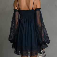 Navy off-shoulder chiffon mini dress with smocked bodice and lace sheer sleeves, back view.