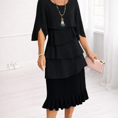 Black ruffle tier midi dress with layered ruffles and scalloped hem