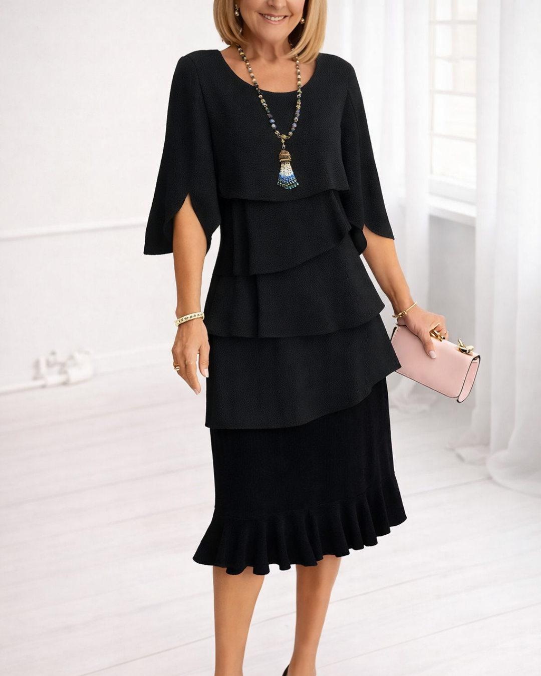 Black ruffle tier midi dress with layered ruffles and scalloped hem