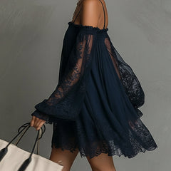 Navy off-shoulder chiffon mini dress with smocked bodice, lace sheer sleeves, tiered skirt.