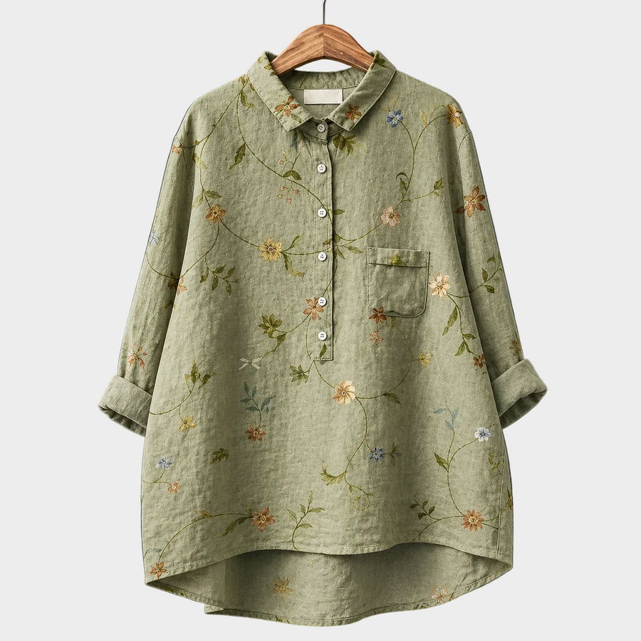 Blusa estiva verde oliva in lino, maniche lunghe, bottoni frontali, tasca sul petto, fiori.