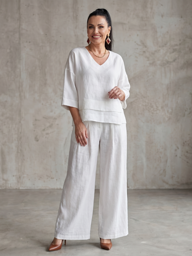 White layered V-neck top with wide-leg pants set, front full-length view