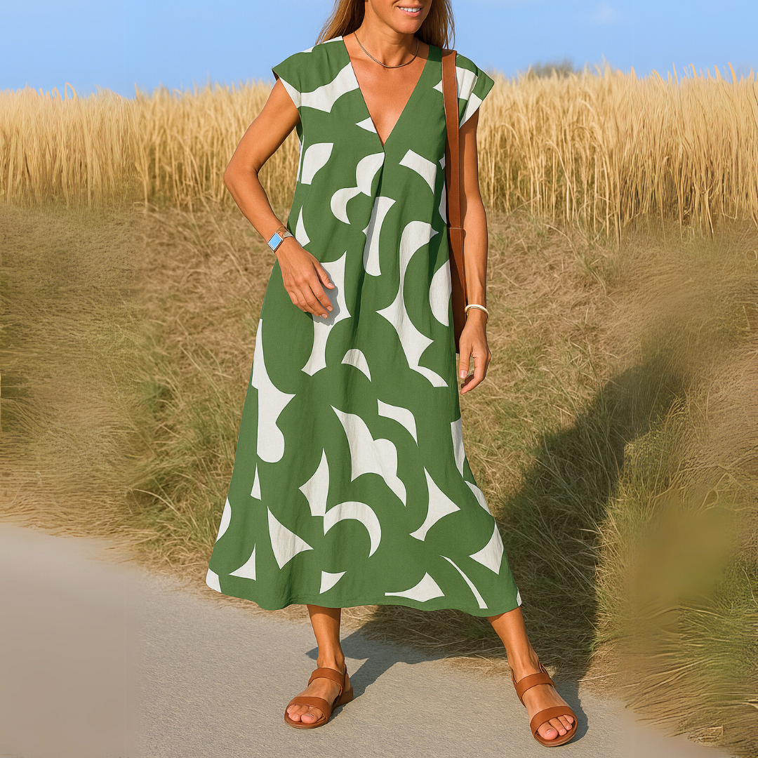 Abito midi verde con scollo a V e maniche corte, stampa bianca astratta