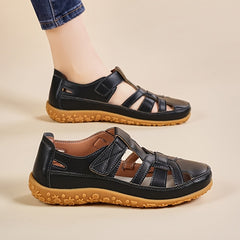 Sandali comfort Lea neri con cinturini e suola marrone con stampa