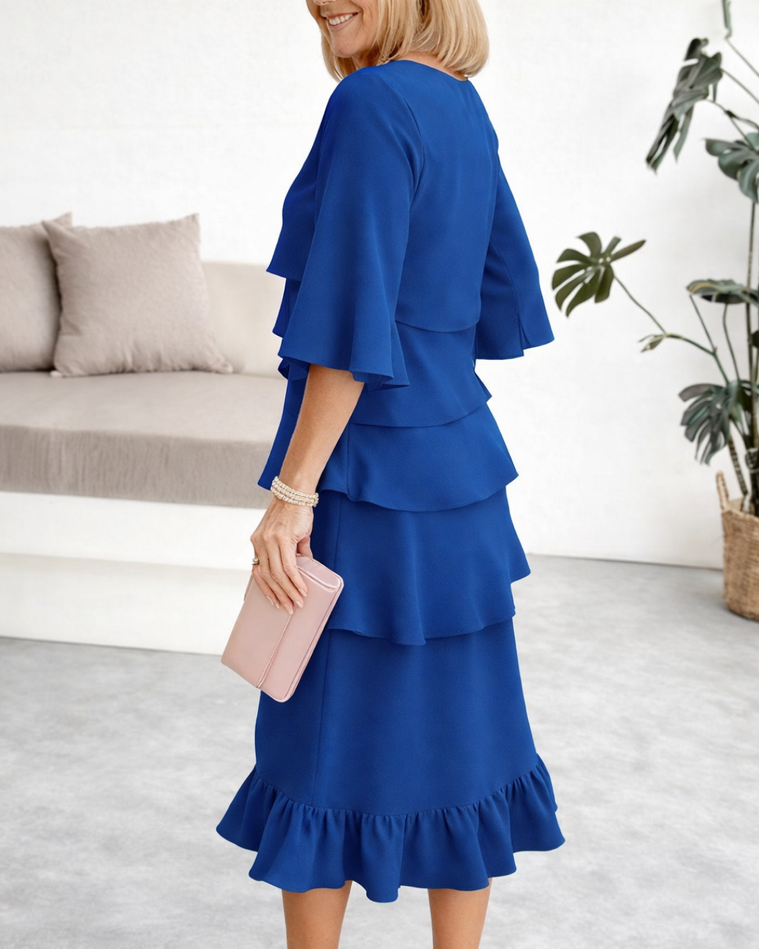 Blue ruffle tier midi dress with short cape sleeves and layered skirt