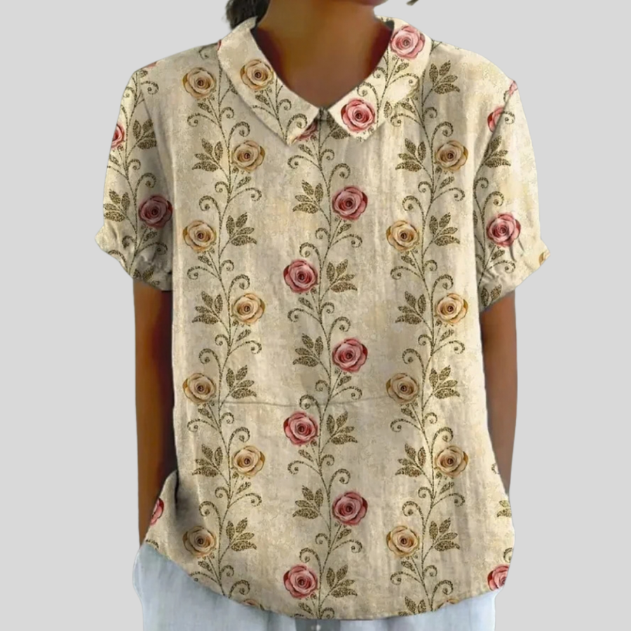 Top floreale a maniche corte con scollo a V, fondo beige e rose multicolori