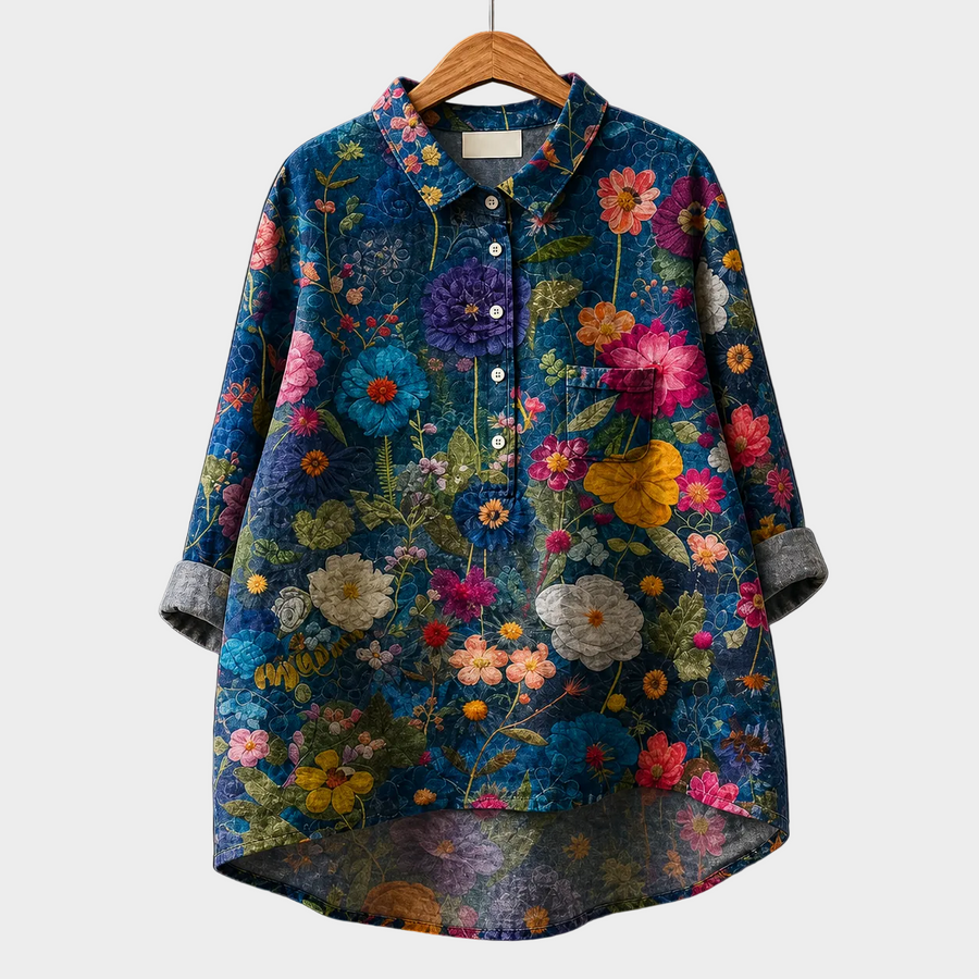 Blusa estiva in tessuto blu scuro con bottoni e stampa floreale colorata, maniche lunghe