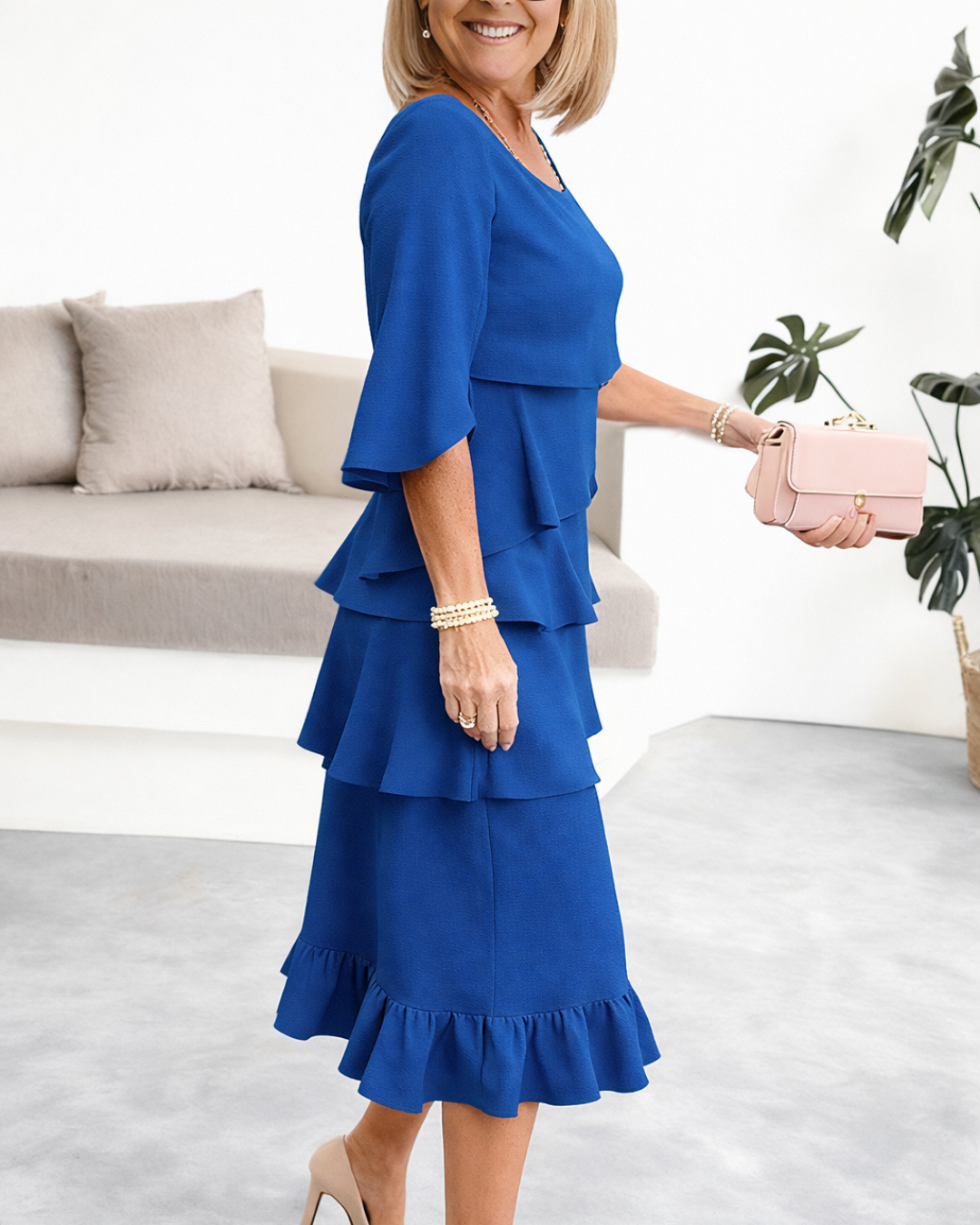 Blue ruffle tier midi dress with flutter sleeves and tiered hem