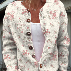Vintage floral knit cardigan sweater with button-front, V-neck, cream and pink pattern