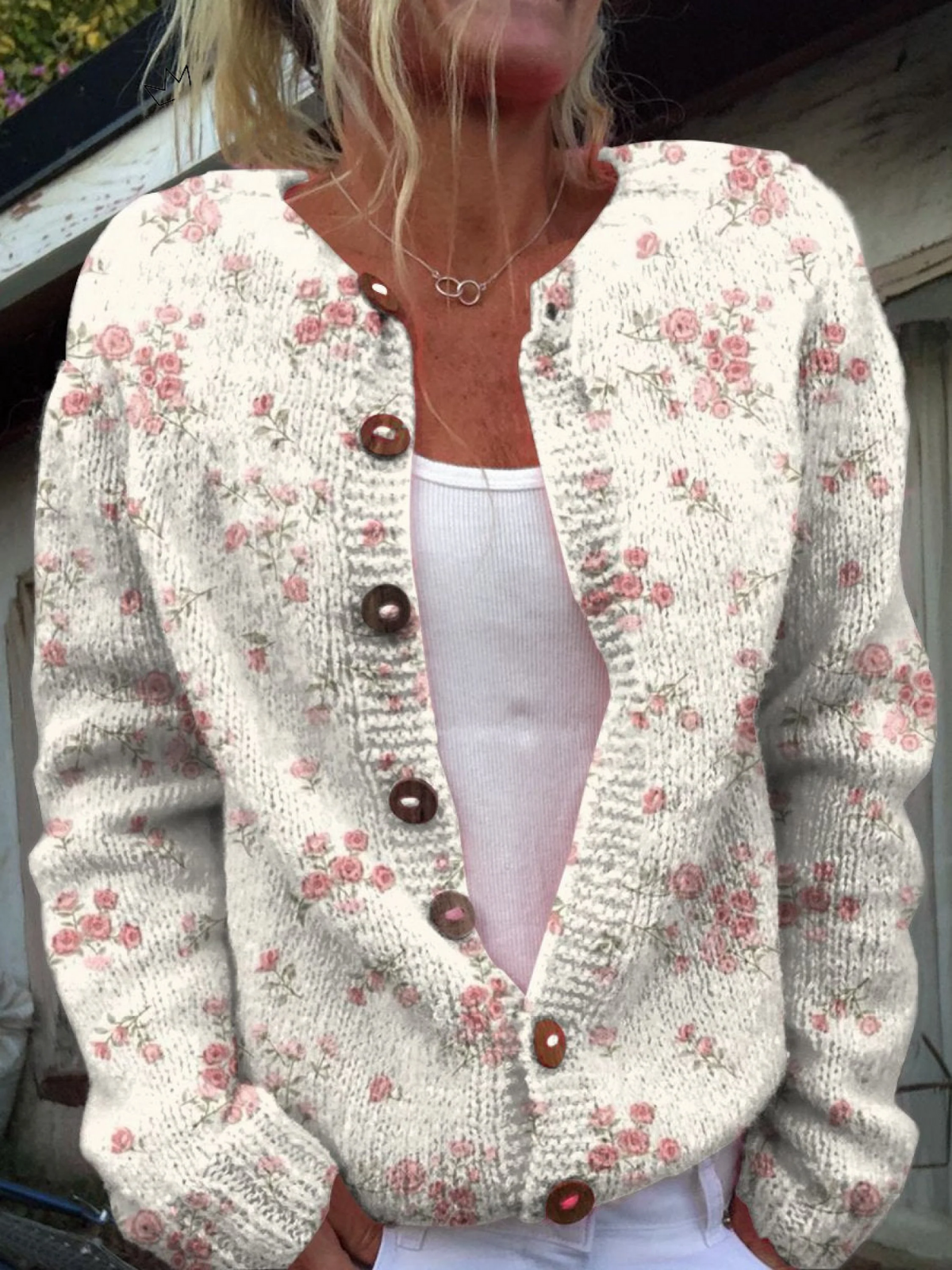 Vintage floral knit cardigan sweater with button-front, V-neck, cream and pink pattern