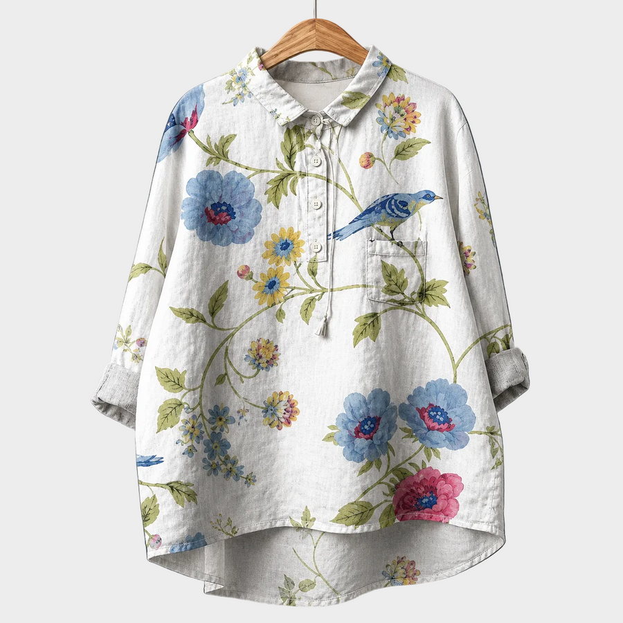 Blusa estiva elegante bianca con stampa floreale, bottoni e laccetto al colletto