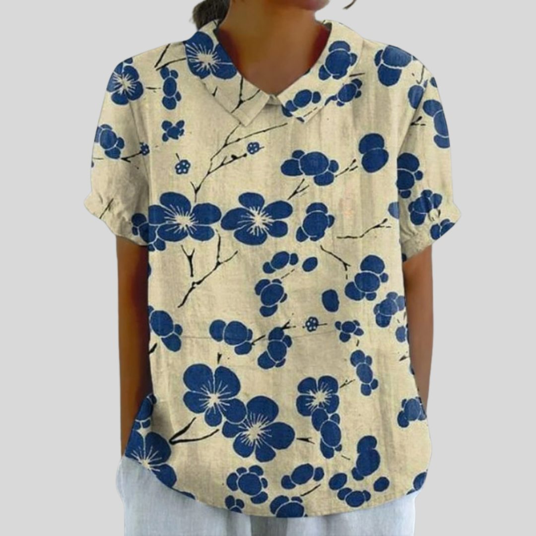 Top floreale maniche corte avorio con stampa fiori blu e colletto con bottoni