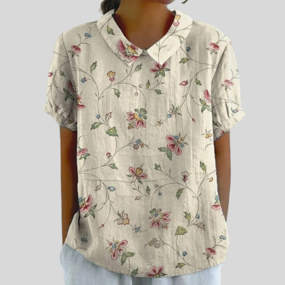 Top beige a fiori, scollo a V con bottoni, maniche corte