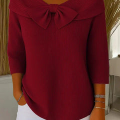 Red sweater with round neckline bow and three-quarter sleeves