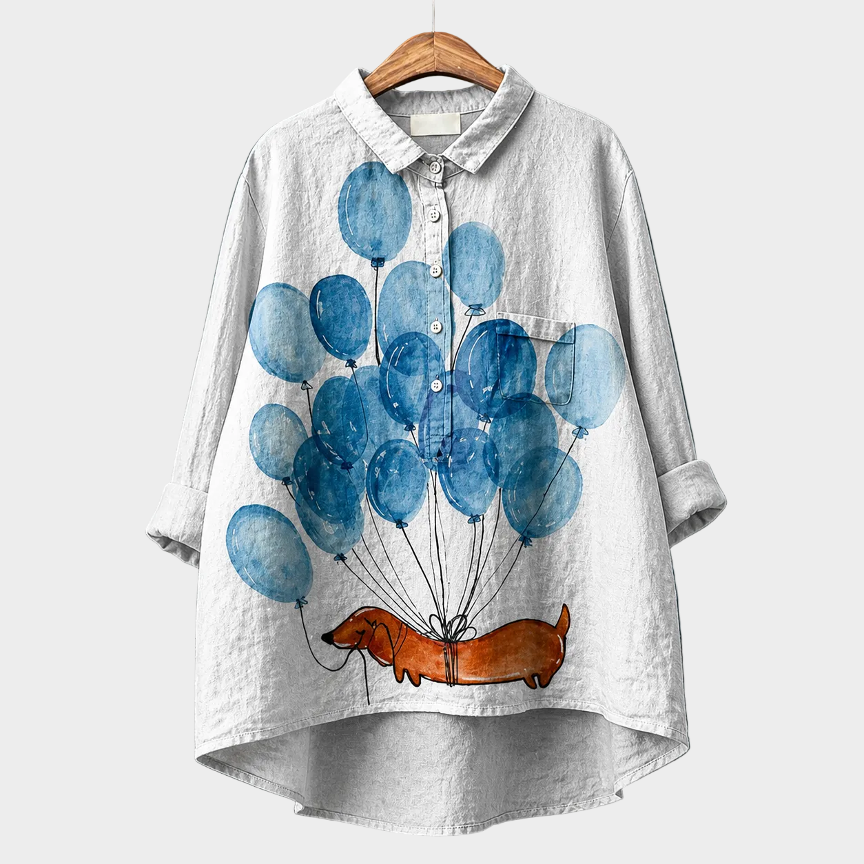 Blusa estiva chiara con colletto e bottoni, maniche a tre quarti, stampa palloncini blu