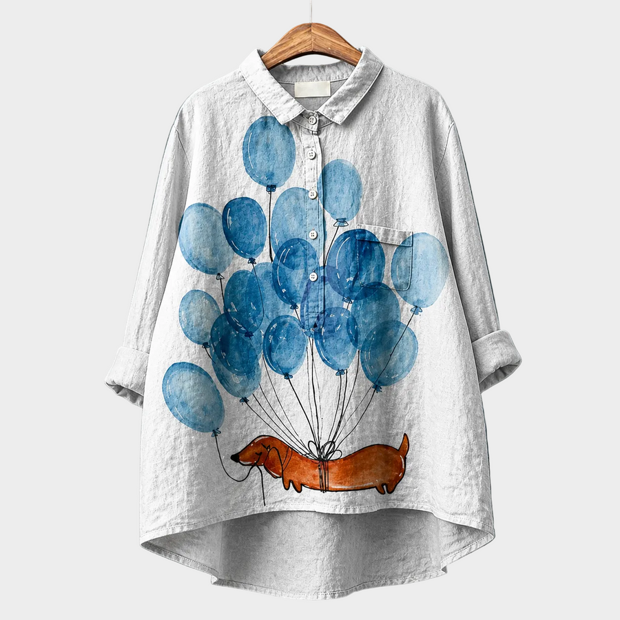 Blusa estiva chiara con colletto e bottoni, maniche a tre quarti, stampa palloncini blu