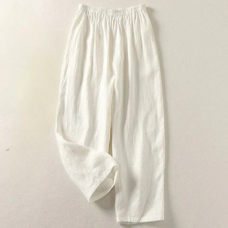 White lightweight trousers with elastic waistband and pleated front