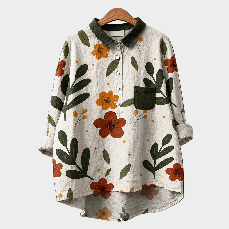Blusa estiva in cotone bianco con colletto, bottoni e stampa floreale arancione e verde