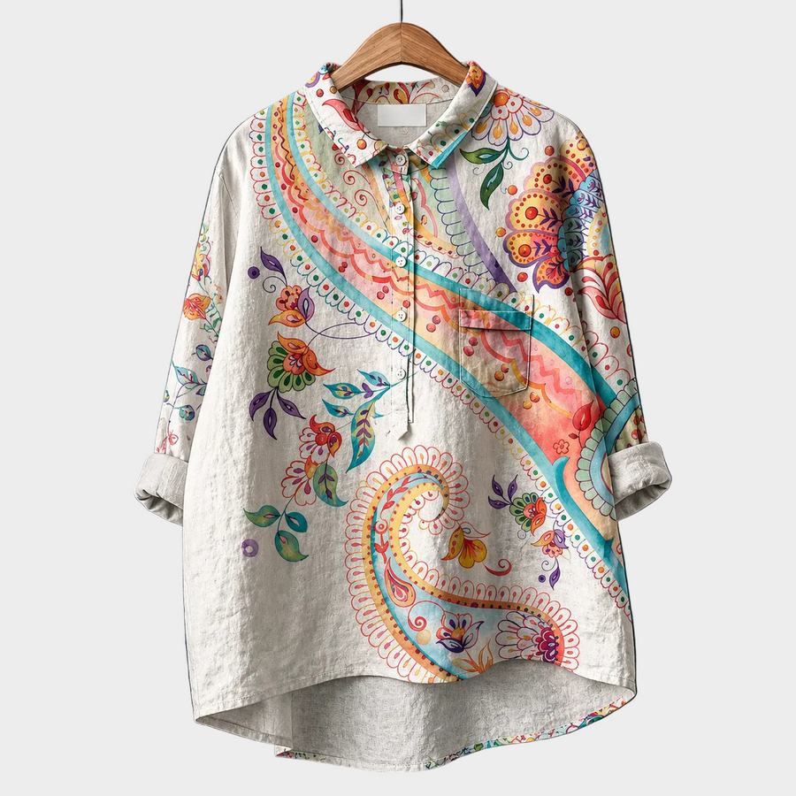 Blusa estiva elegante in tessuto bianco con stampa colorata a fantasia