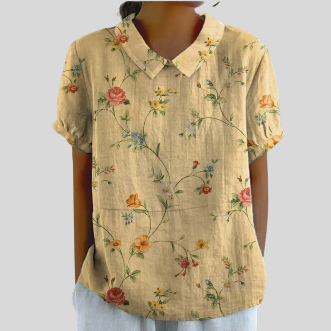 Blusa beige con stampa floreale multicolore, colletto e maniche corte arricciate