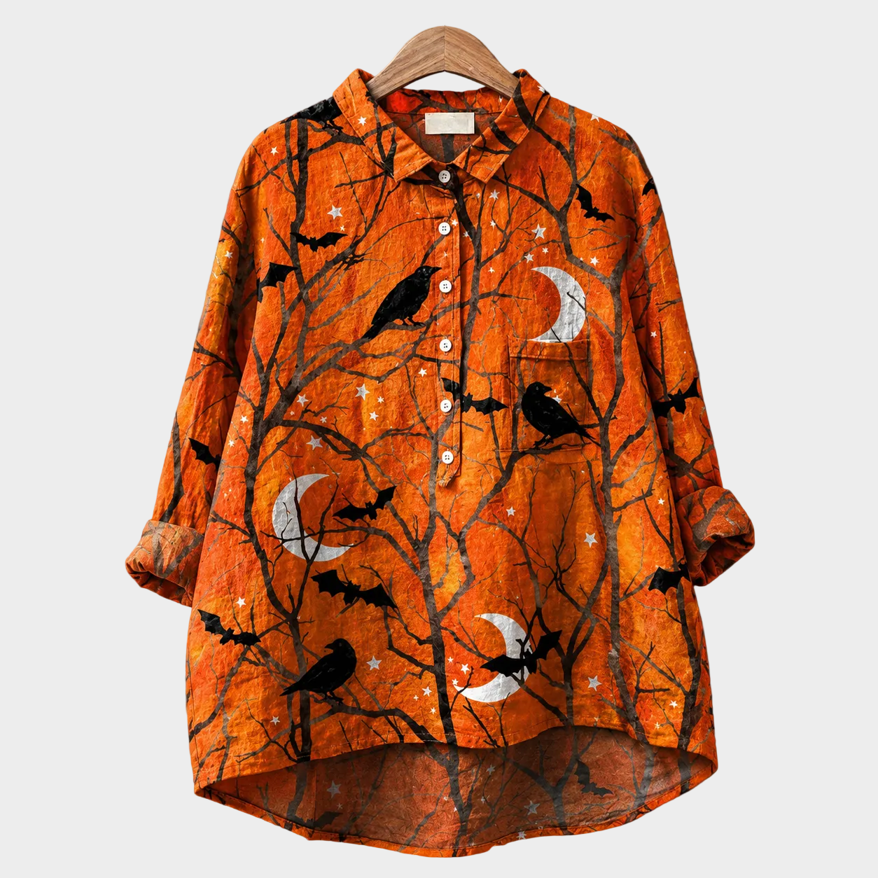 Blusa estiva arancione con stampa scura a uccellini, bottoni e maniche a 3/4