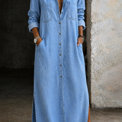 Light blue button-through denim dress with collar, chest pockets, and front slit