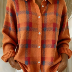 Orange plaid knit cardigan with button front, collared V-neck, long sleeves