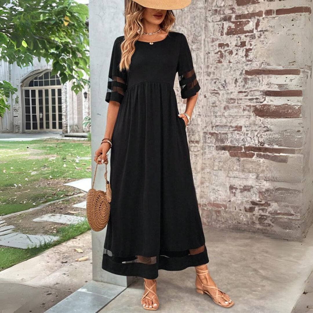Black midi dress with gathered waist, sheer stripe sleeves, and sheer hem panel