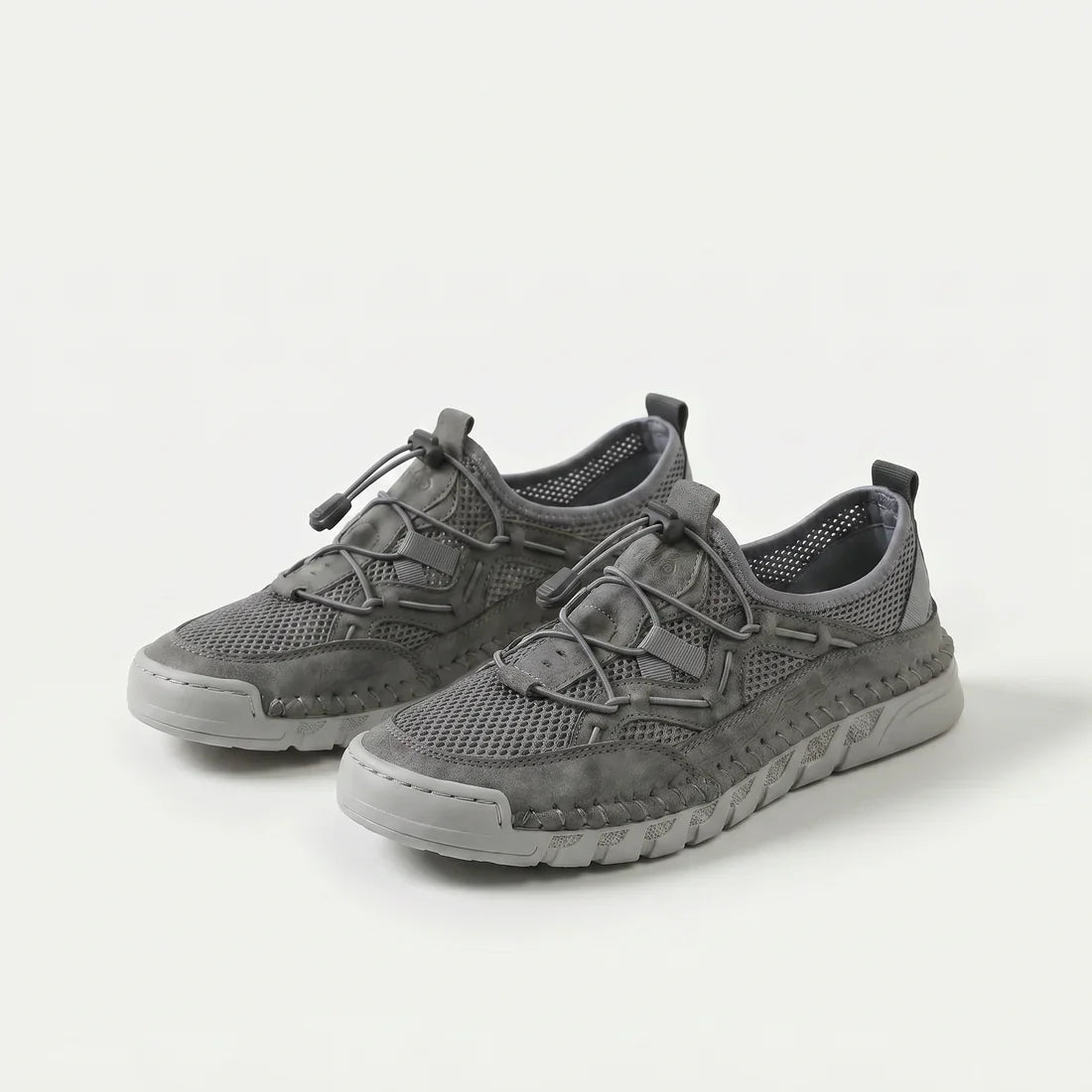 Scarpe comfort traspiranti grigie con lacci, tomaia traforata e suola beige