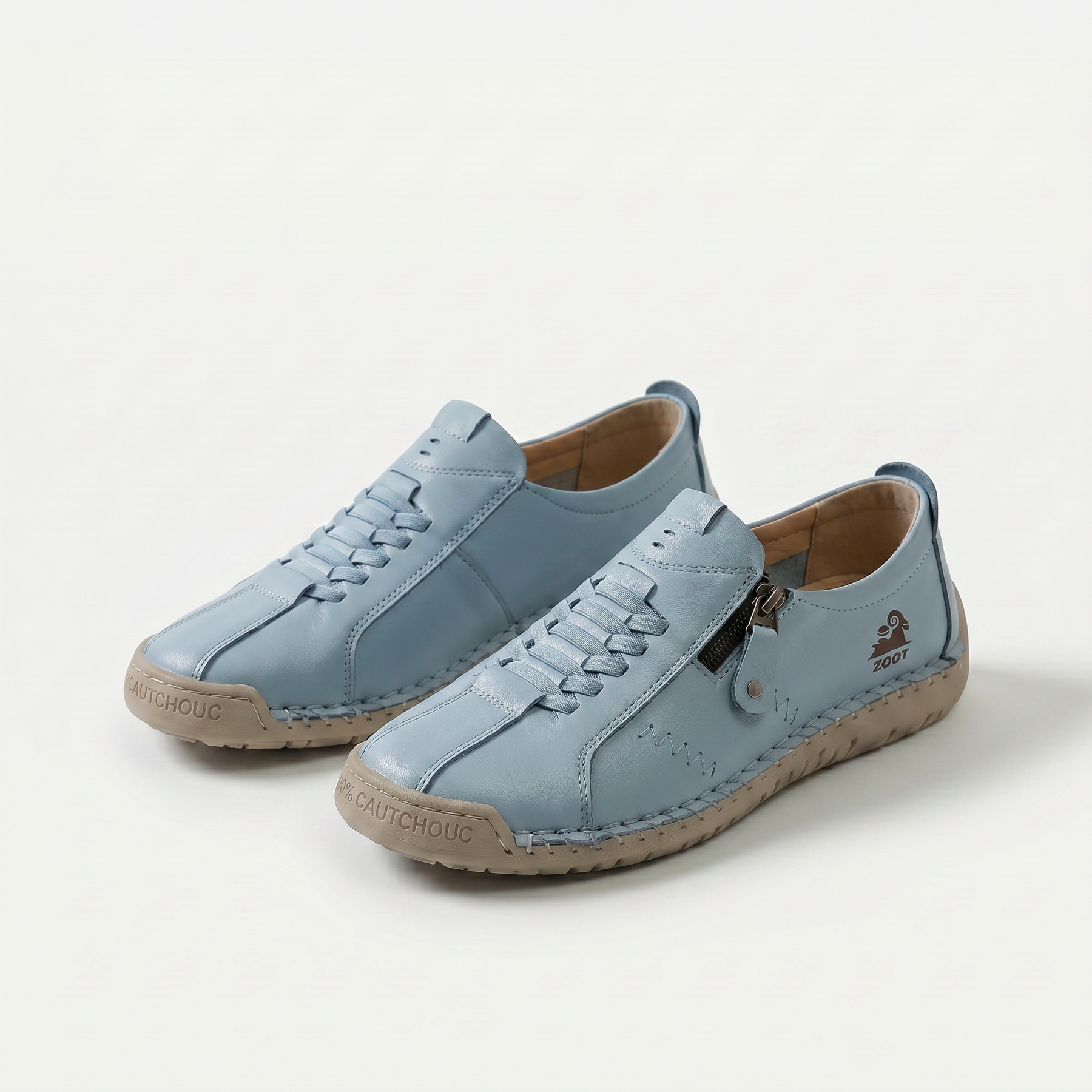 Scarpe comfort ergonomiche azzurro chiaro con lacci e zip laterale.