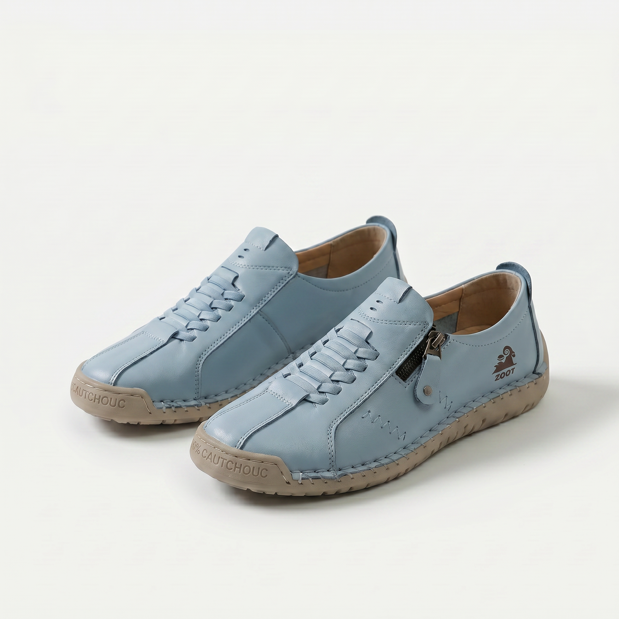 Scarpe comfort ergonomiche azzurro chiaro con lacci e zip laterale.