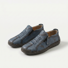 Scarpe comfort ergonomiche blu scuro con lacci e zip laterale, suola spessa.