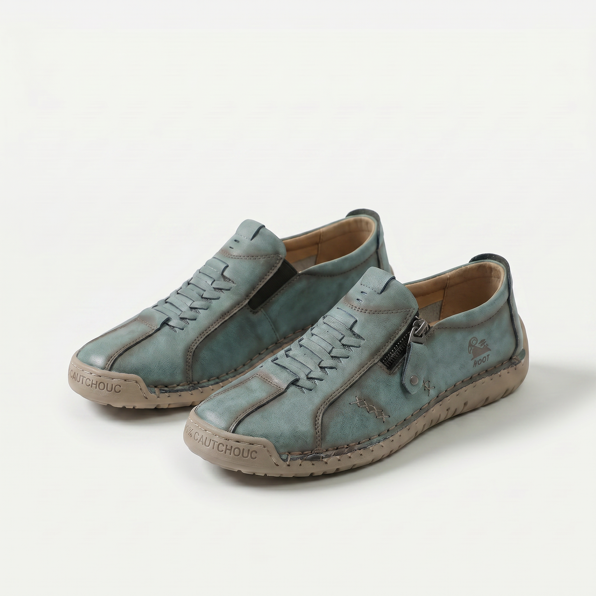 Scarpe comfort ergonomiche verdi con lacci e zip laterale, cuciture a vista.