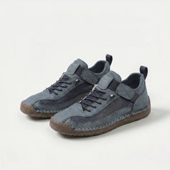 Scarpe ortopediche traspiranti grigie scure con lacci e cinturini, suola in gomma.