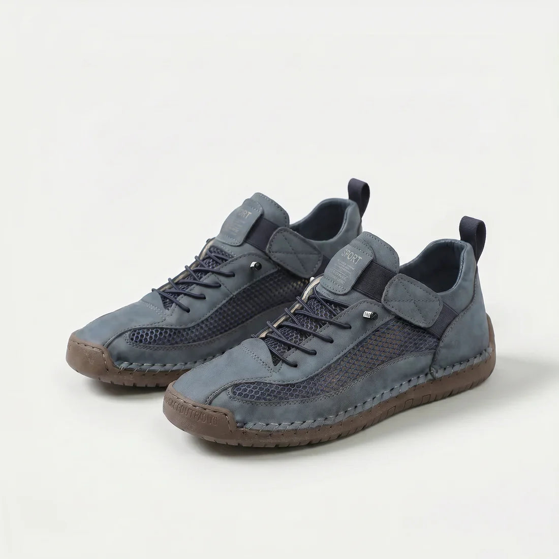 Scarpe ortopediche traspiranti grigie scure con lacci e cinturini, suola in gomma.