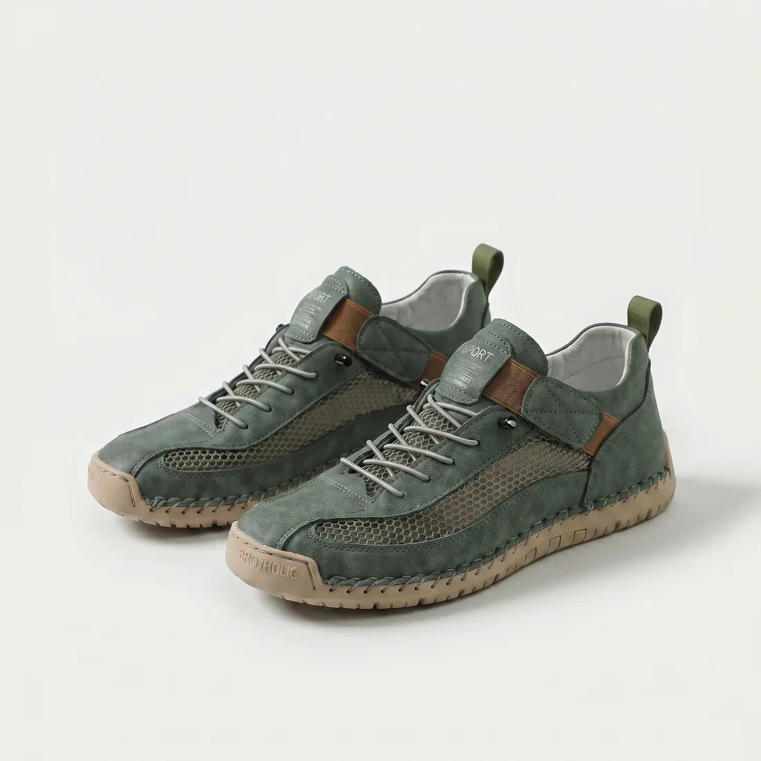Scarpe ortopediche traspiranti verdi con lacci e cinturino, suola ammortizzata beige.
