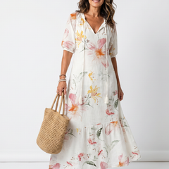 White floral tiered midi dress with V-neck and 3/4 sleeves