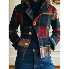 Plaid wool jacket with button front, red blue brown and tan patchwork blocks.