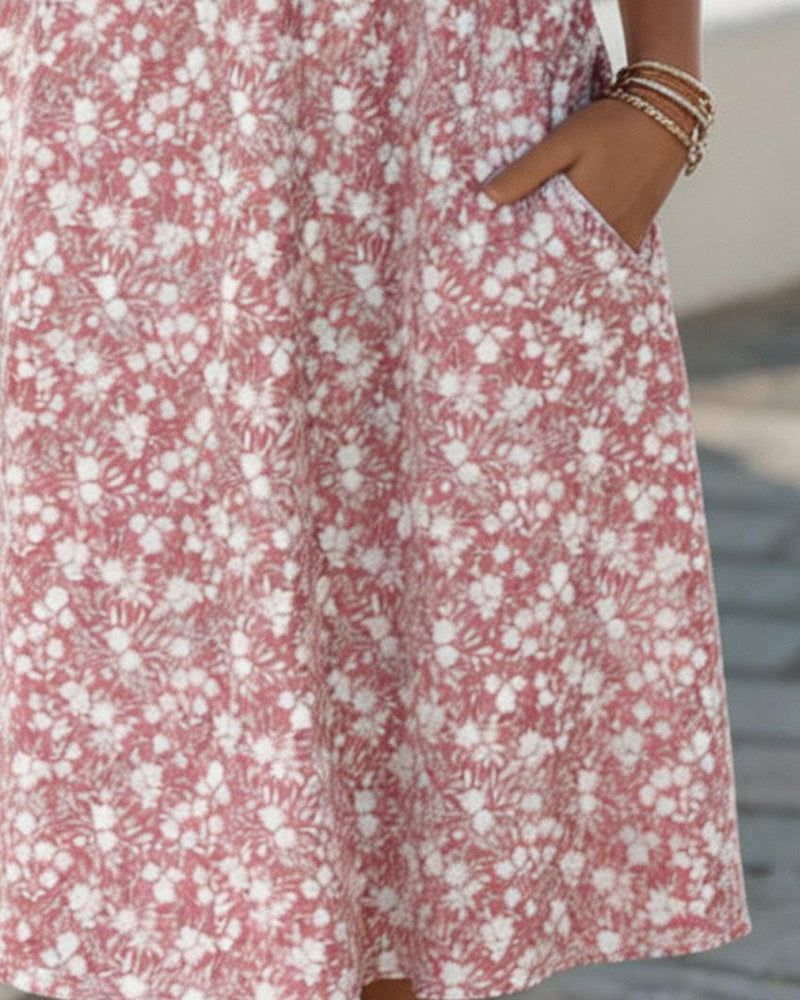Abito midi floreale rosa con stampa all-over, gonna con pieghe leggere