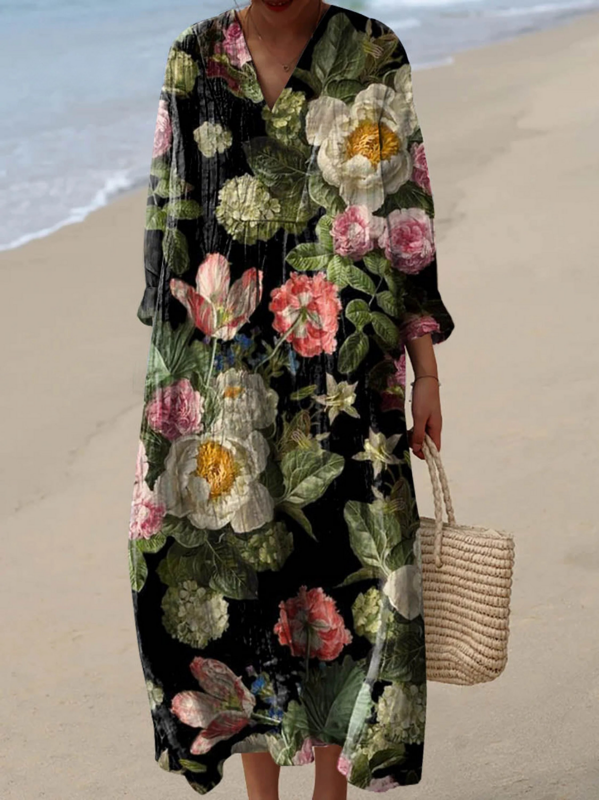 Boho maxi dress with long sleeves and floral print on dark green base