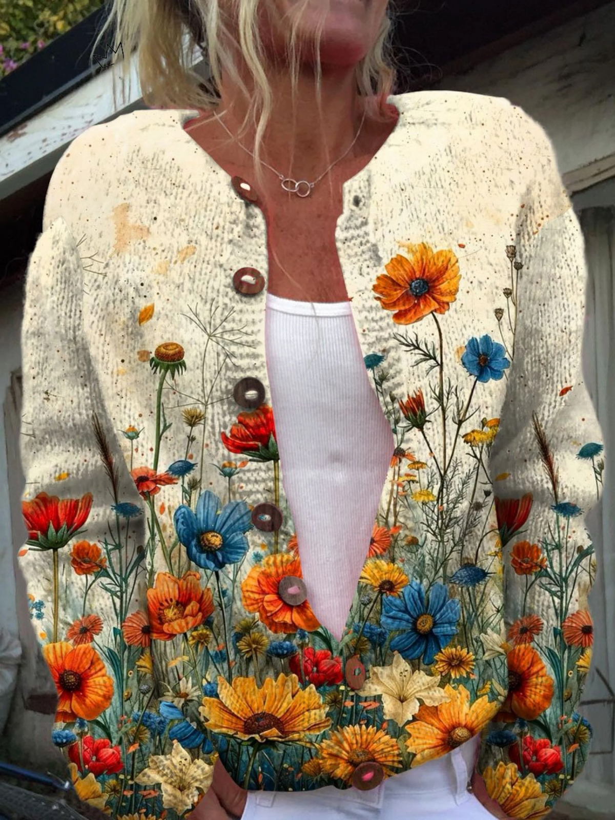 Cream cardigan sweater with vintage floral print, button-front and V-neck