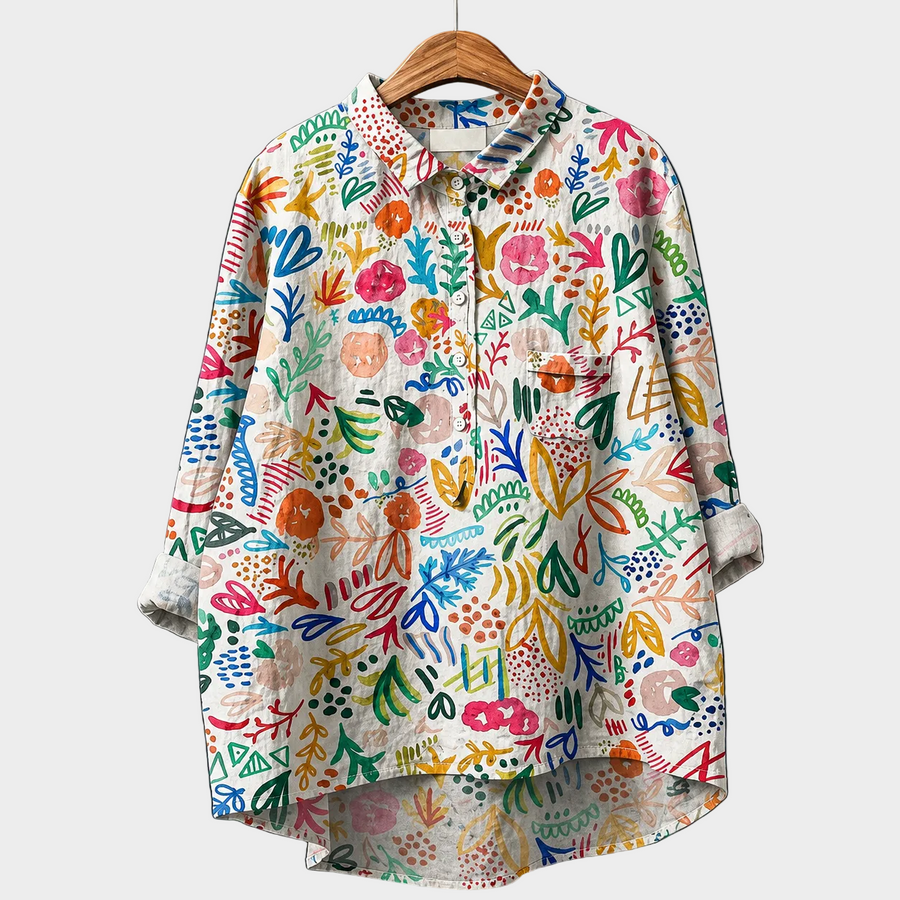 Blusa estiva in tessuto leggero bianco con stampa floreale multicolore e bottoni
