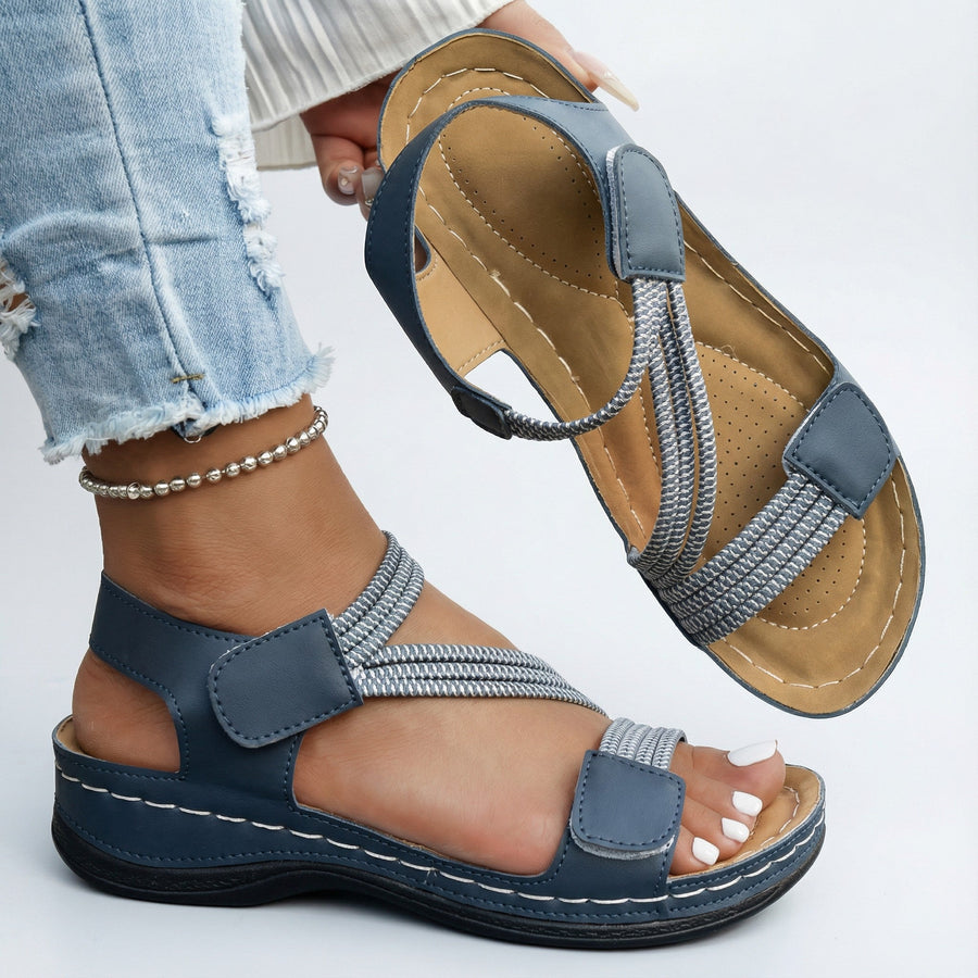 Sandali ortopedici comodi blu con cinturino regolabile e fascia elastica sul piede