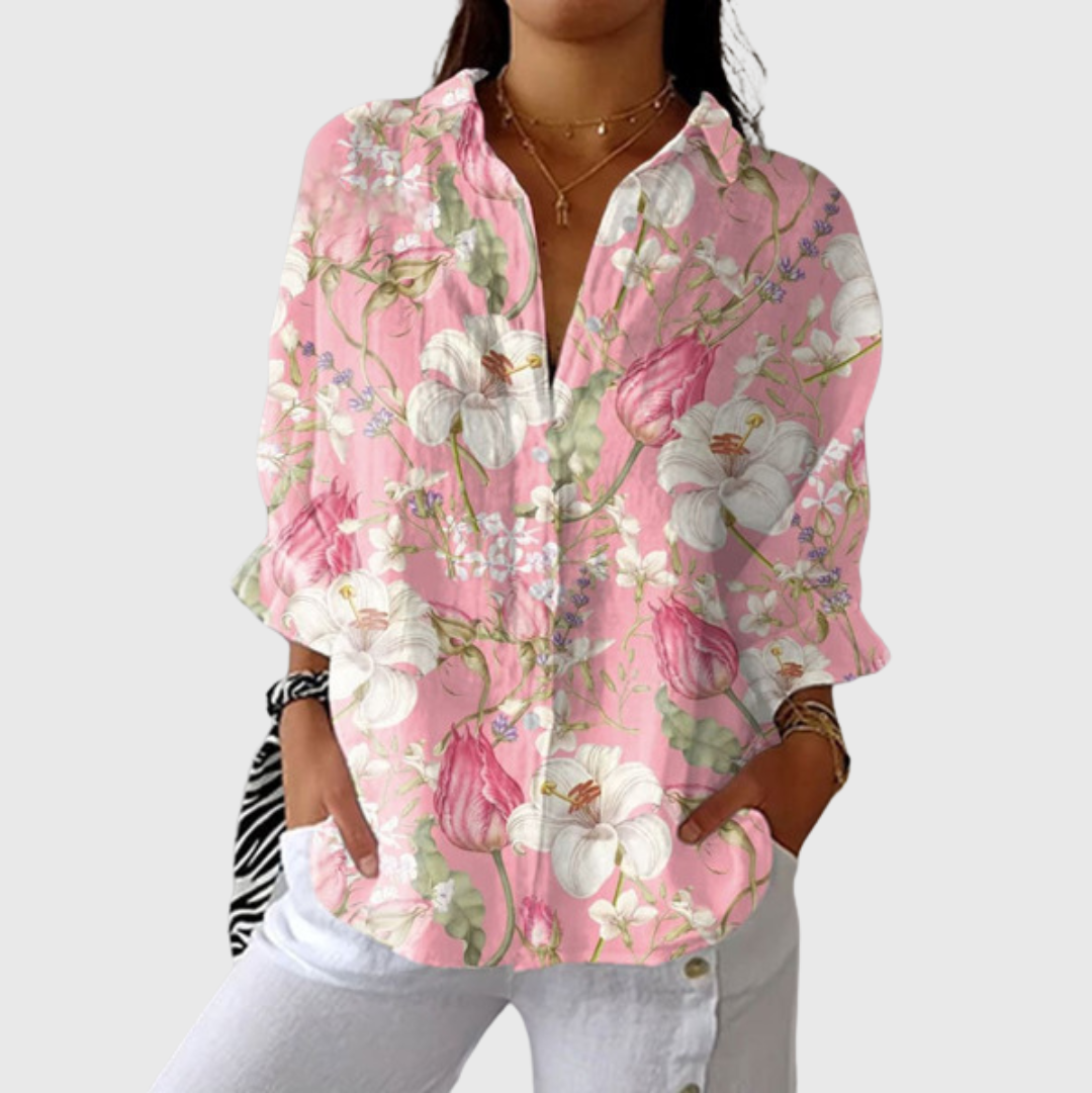 Blusa leggera rosa con stampa floreale multicolore e scollo a V
